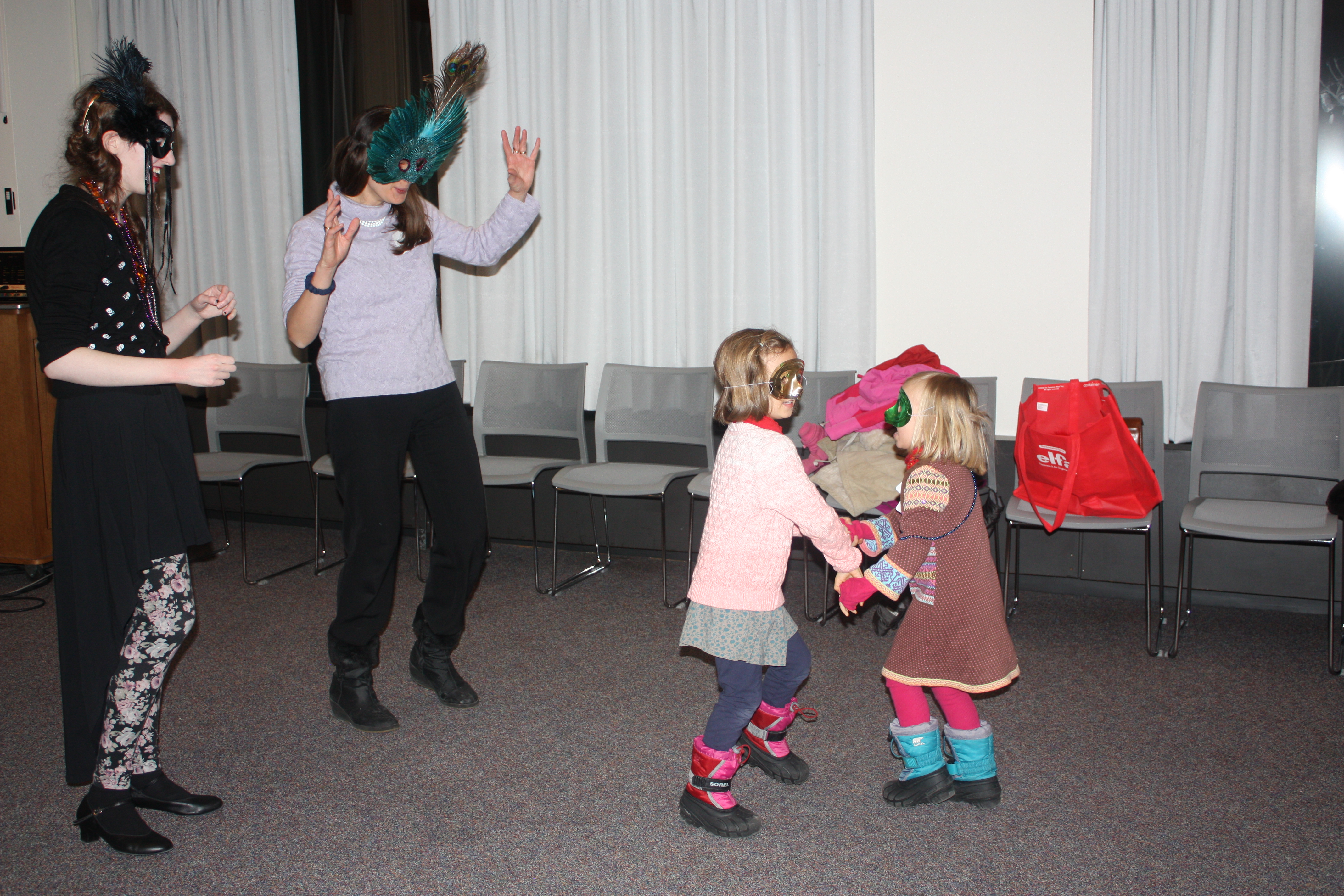 Professor Marianne Hopman and her daughters dance at the event