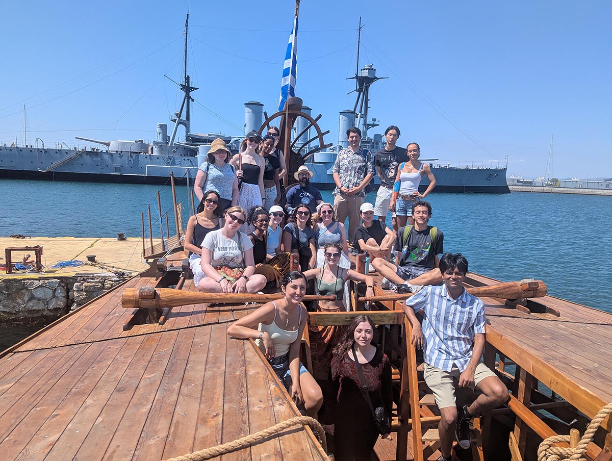 Northwestern students on the summer 25 program visiting a replica trireme.